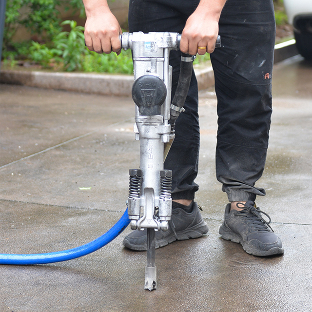 Perceuse pneumatique portative pour l'extraction de pierre